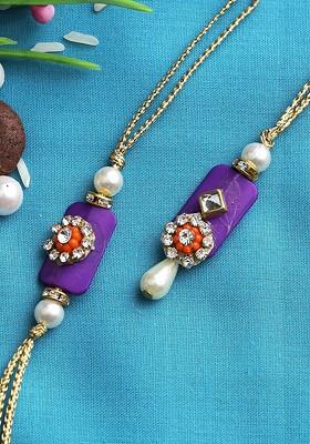 Pack Of 2 Purple Pearl Embellished Bhaiya Bhabhi Rakhi Set