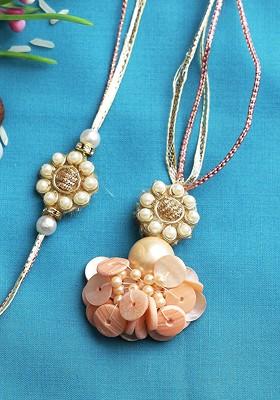 Set Of 2 Peach Coloured And White Pearl Beaded Rakhi