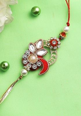 Red And Gold Toned Artistic Kundan Embedded Rakhi