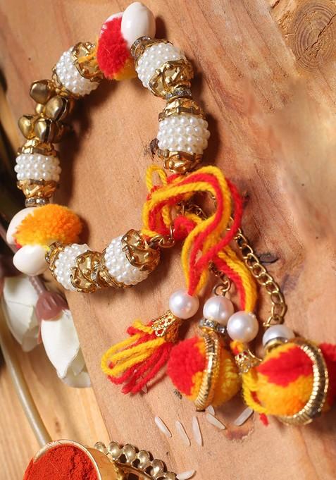 Red And Gold Toned Stone Studded Hath Phool Rakhi