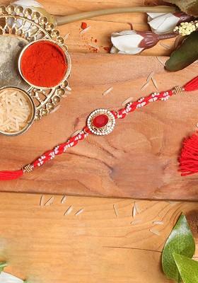 Red And White Beaded Rakhi With Red Stone