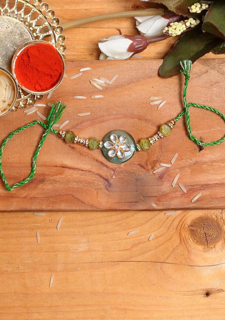 Grey And Silver Toned Stone Studded Floral Rakhi - Indya