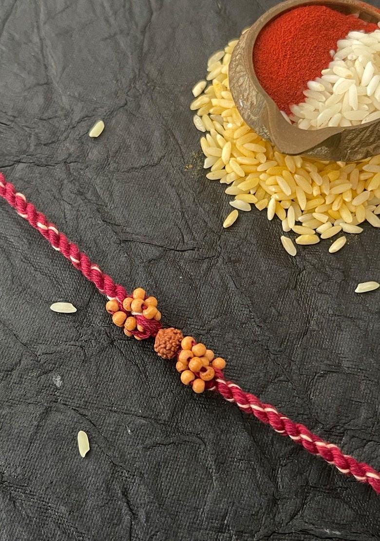 Men Red And Yellow Rudraksha Beaded Rakhi