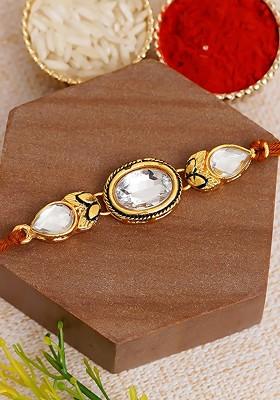 White And Gold Toned Kundan Studded Rakhi