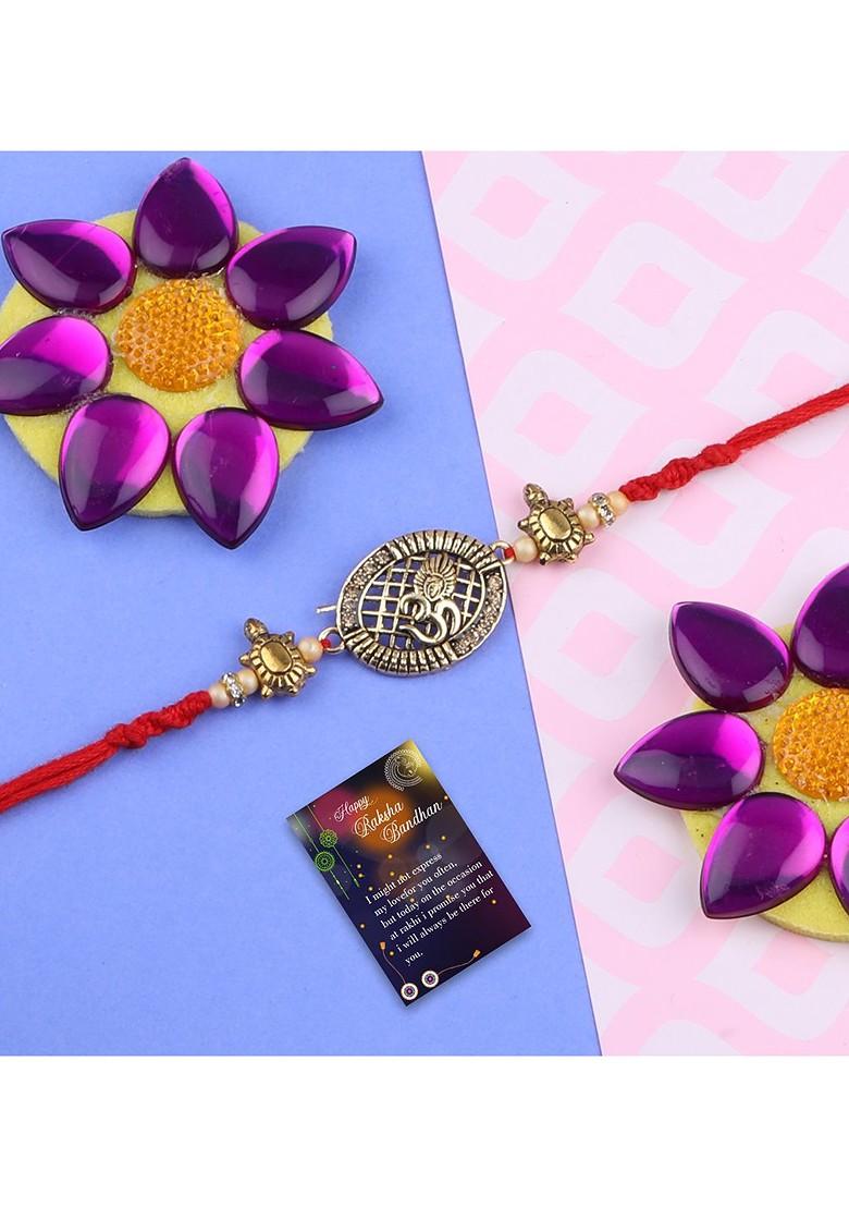 Gold Toned 2 Rakhi With Roli Chawal And Greeting Card