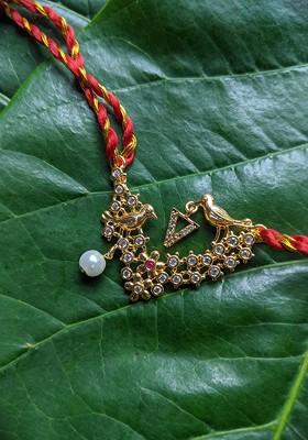 Men Gold Plated White Ad Studded And Beaded Thread Rakhi
