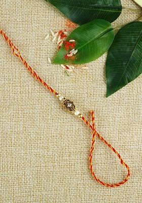 Red And Gold Toned Traditional Golden Bead Handcrafted Mauli Rakhi