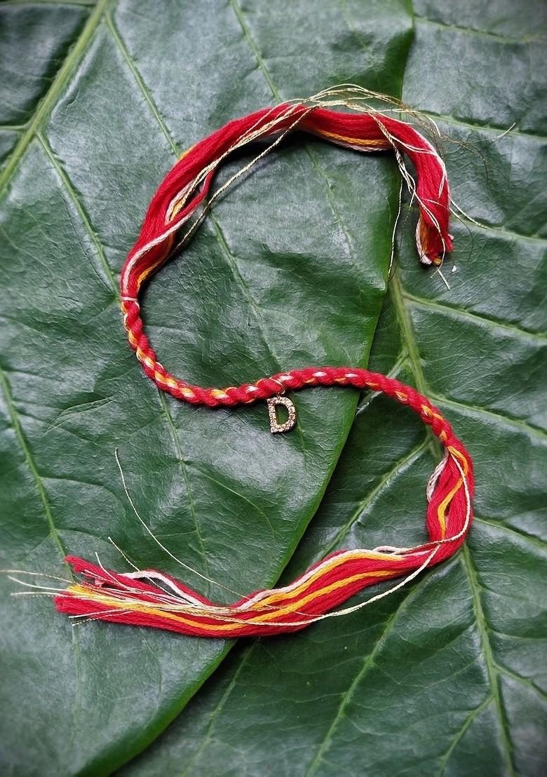 Men Gold Plated Red And Yellow Ad Studded D Alphabet Customized Thread Rakhi - Indya