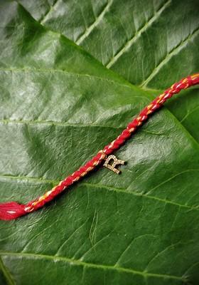 Men Gold Plated Red And Yellow Ad Studded R Alphabet Customized Thread Rakhi