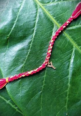 Gold Plated Red And Yellow Ad Studded Y Alphabet Customized Thread Rakhi