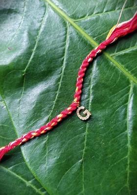 Unisex Gold Plated Red Ad Studded G Alphabet Customized Thread Rakhi