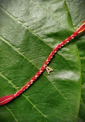 Men Gold Plated White And Red Ad Studded A Alphabet Customized Thread Rakhi