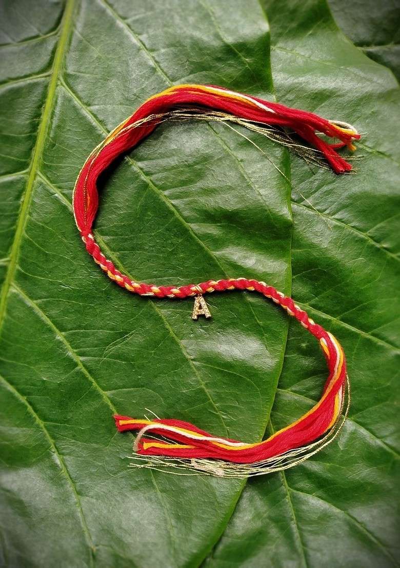 Men Gold Plated White And Red Ad Studded A Alphabet Customized Thread Rakhi - Indya