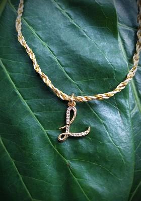 Men Gold Plated White And Cream Coloured Ad Studded L Alphabet Customized Pendant Thread Rakhi