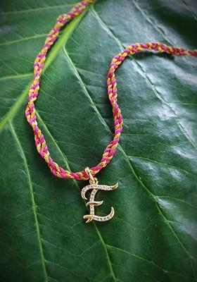 Men Gold Toned And Red Ad Studded Letter E Customized Thread Rakhi