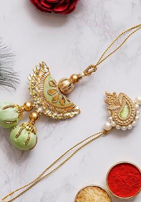 Gold Toned And Green Rakhi Gift Set