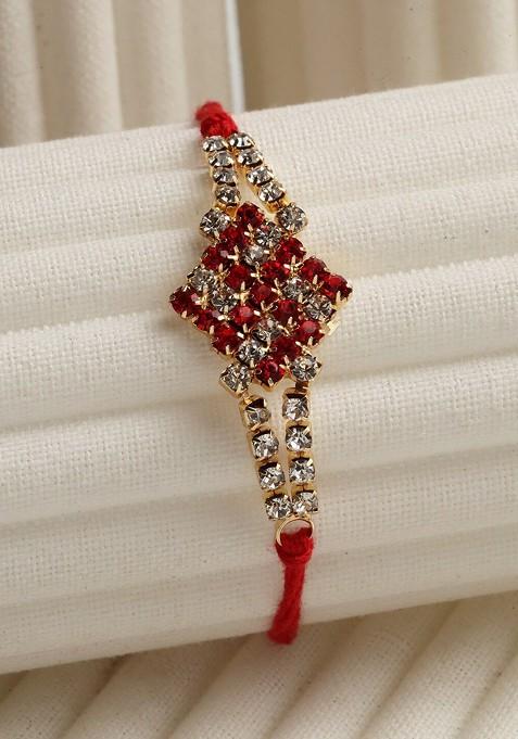 Gold Toned Ad Stoned Studded Swastik Rakhi