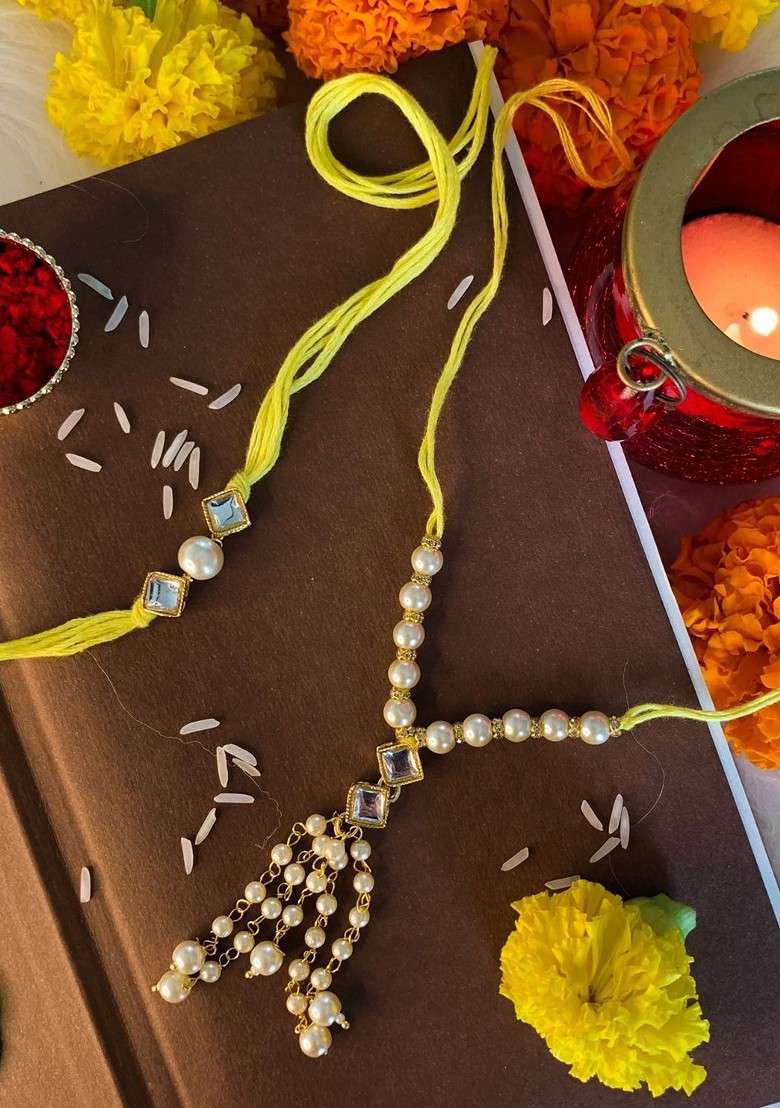 Set Of 2 White And Gold Toned Studded And Beaded Bhaiya Bhabhi Rakhis - Indya