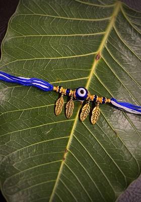 Blue And White Evil Eye Turkish Charm With Leaf Mauli Rakhi
