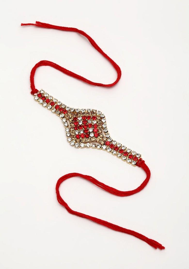 Gold Toned Cz Studded Swastik Rakhi With Mug And Roli Chawal - Indya