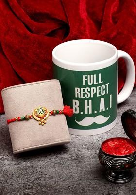 Gold Toned And Red Beaded Khanda Rakhi With Mug And Roli Chawal Gift Set