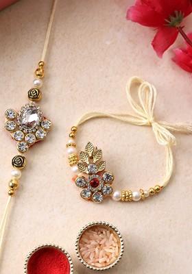 Set Of 2 Gold Plated Floral Shaped Rakhis With Roli Chawal With Roli Chawal