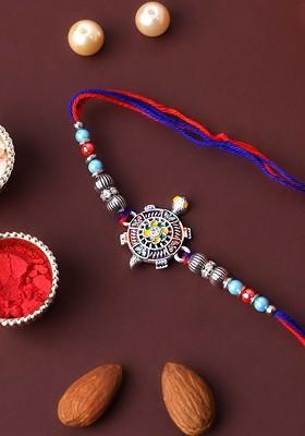 Silver Plated Tortoise Shaped Thread Rakhi With Roli Chawal