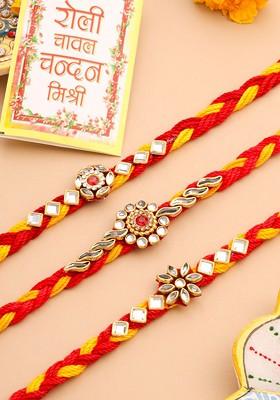Set Of 3 Red And Yellow Kundan Studded Thread Rakhi With Roli Chawal Chandan And Mishri