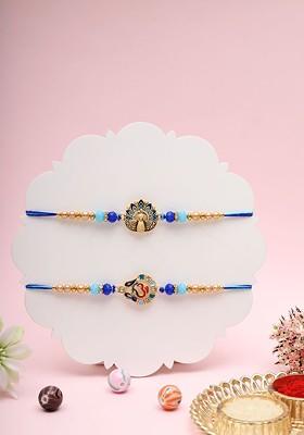 Set 0F 2 Peacock And Om Thread Rakhi With Roli Chawal And Greeting Card