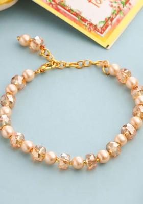 Gold Toned Artificial Beads Wraparound Rakhi