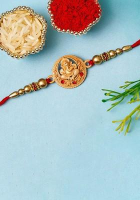 Artfificial Stones Studded And Beaded Lord Ganesha Rakhi With Roli Chawal
