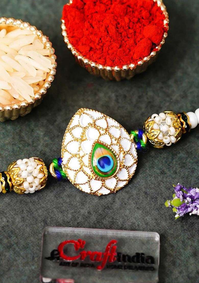 Peacock Feather Pearls Designer Thread Rakhi - Indya