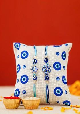 Set Of 2 Artfificial Stones Studded And Beaded Floral Rakhi With Roli Chawal