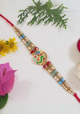 Artificial Stones Studded And Beaded Thread Rakhi With Roli Chawal