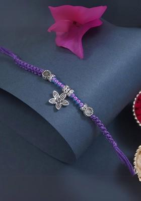 Silver Plated Artificial Stones Studded And Beaded Star Shaped Rakhi And Roli Chawal
