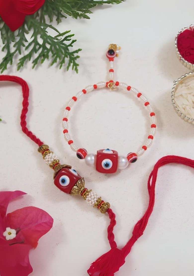2 Pieces Enamel Evil Eye Bhaiya Bhabhi Lumba Rakhi Set With Roli Chawal - Indya