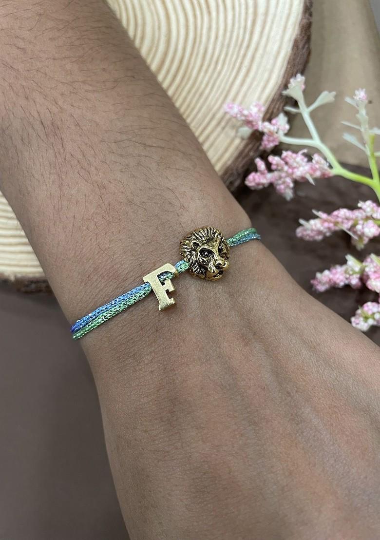 F Letter Lion Charm Thread Rakhi - Indya