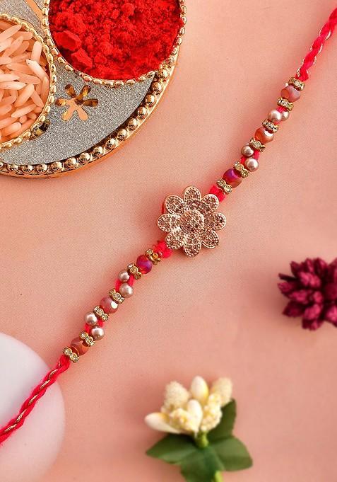 Gold Toned Beaded Floral Rakhi With Roli Chawal And Greeting Card