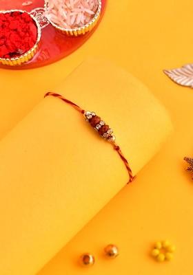 Gold Toned Beaded Rakhi With Roli Chawal And Greeting Card