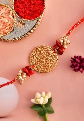 Gold Toned Pearl Beaded Rakhi With Roli Chawal And Greeting Card