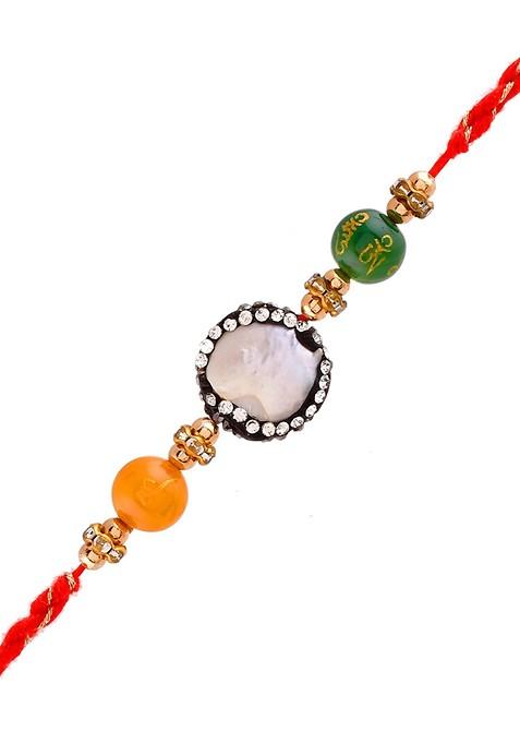 Orange Stone Studded And Beaded Thread Rakhi With Roli Chawal And Greeting Card