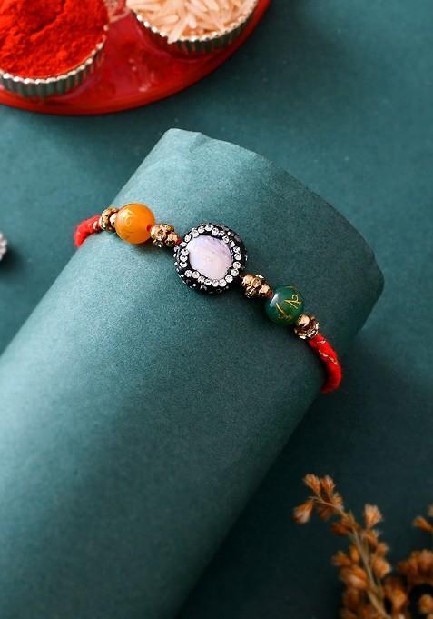 Orange Stone Studded And Beaded Thread Rakhi With Roli Chawal And Greeting Card