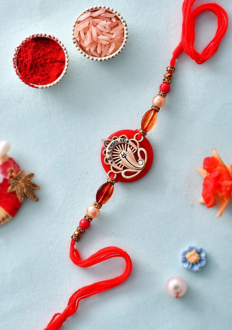 Red Resin Based Ganesha Rakhi With Roli Chawal And Greeting Card