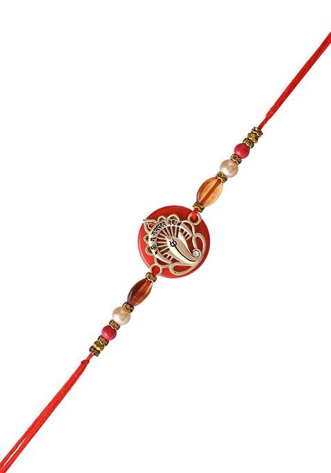 Red Resin Based Ganesha Rakhi With Roli Chawal And Greeting Card