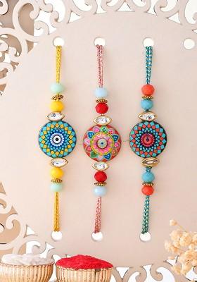 Set Of 3 Thread Rakhis With Roli Chawal And Greetings Card