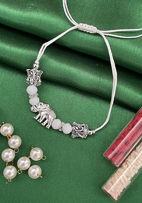 Lord Ganesha Beaded Thread Rakhi