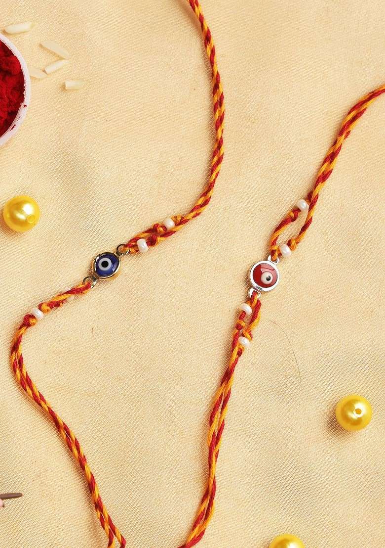 Set Of 2 Evil Eye Rakhis With Rholi Chawal And Greeting Card - Indya