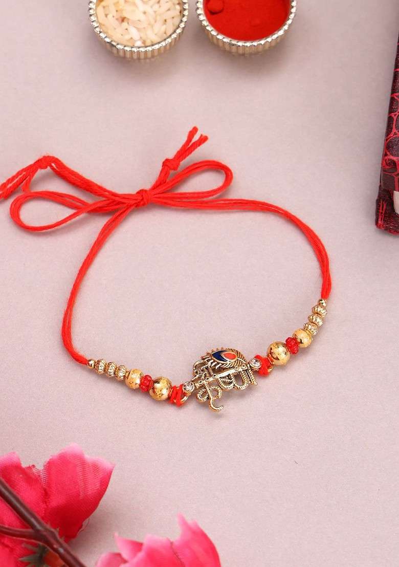 Gold Plated Name Of Krishna Shaped Stone Studded Rakhi With Roli Chawal - Indya