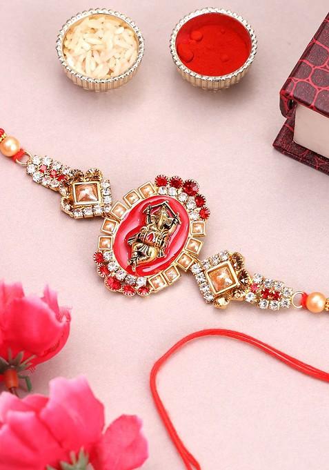 Gold Plated Ganesh Shaped Beads And Stone Studded Rakhi With Roli Chawal