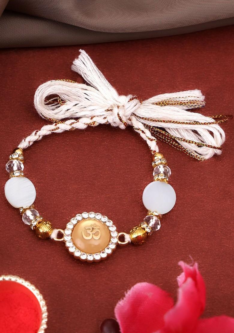 Gold Plated Om Shaped Beaded With Stone Studded Thread Rakhi With Roli Chawal - Indya